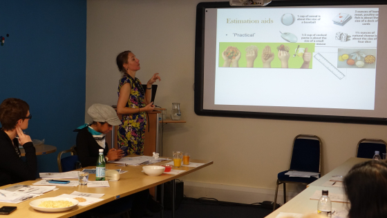 Dr Kathryn Hart presenting on estimation aids during workshop